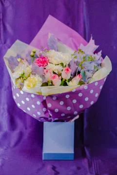 A bouquet of flowers is in the box. Stock Photos