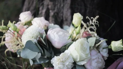 Bouquet of flowers on the grass close-up Stock Footage 73445153