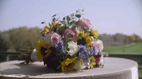 Bouquet of Flowers outside on a table. Stock-Footage 253505664