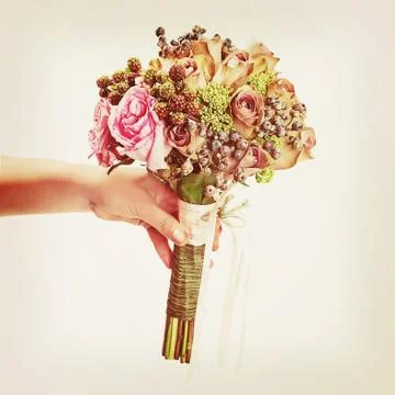 Bouquet from flowers with retro filter effect. Stock Photos