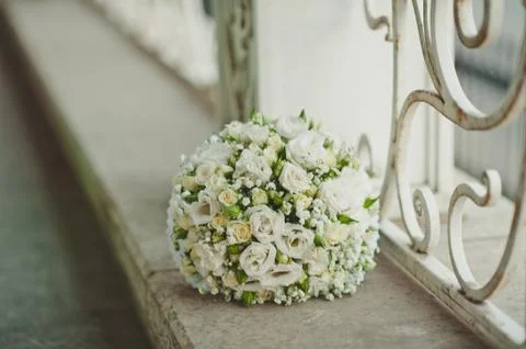 Bouquet on a handrail. Stock Photos