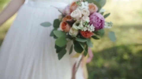 Bouquet in the hands of the bride Stock Footage 82706028