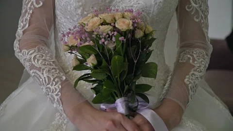 Bouquet in hands Stock Footage 150786328