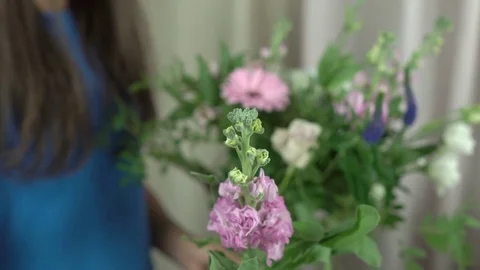 Bouquet making process in flower salon close-up 4k. Stock Footage 80360519