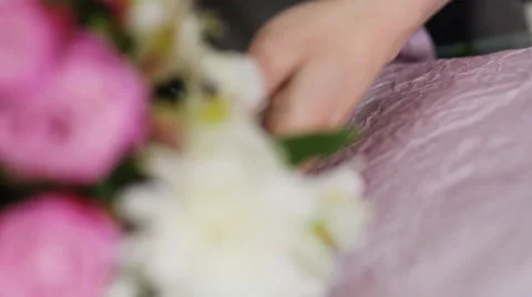 Bouquet making process in a flower store Stock Footage 63338761