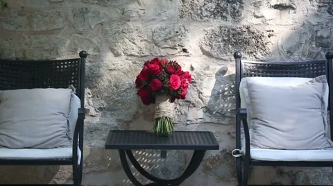 A bouquet of red flowers on the table Stock Footage 44876549