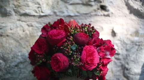 A bouquet of red flowers on the table Stock Footage 45290728