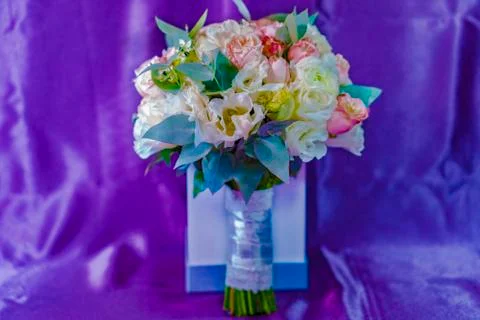 A bouquet of roses and eustoma, eucalyptus, rose bombastique, ornithogalum. 스톡 사진