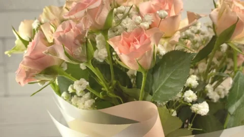Bouquet of roses rotating on a white background. Stock Footage 150789451