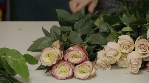 Bouquet of roses on the table Stock Footage 87114493