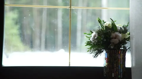 A bouquet in a vase on the window 動画素材 60650267