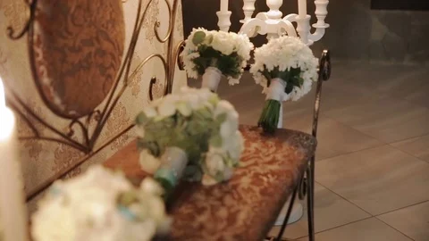 Bouquets on the bench. Switching focus. Wedding decorations Stock Footage 76065422