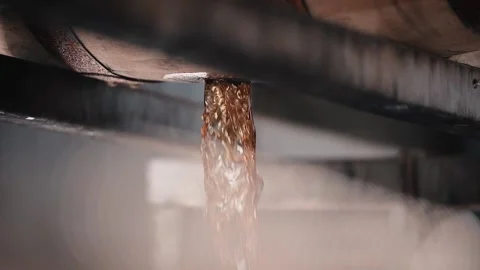 Bourbon Whiskey dumping out of barrel in slow motion Stock Footage