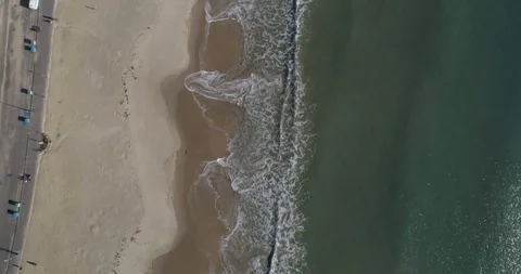 Bournemouth beach birds eye view pan up to reveal long coast line Stock Footage 102405218