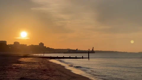 Bournemouth Beach Canoes Two Men Paddling Canoe in Sea 4K 스톡 동영상 221869242