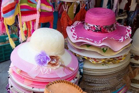 Boutique of Beautiful Hats Array of pink and white hats on display at road... 写真素材