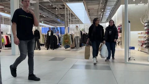A boutique with different clothes in a large shopping mall. Stock Footage 294699287