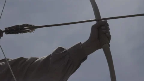 Bow and Arrow - Warrior release in slo-mo. Little Big Horn Indian Wars portrayal Stock Footage 169670384