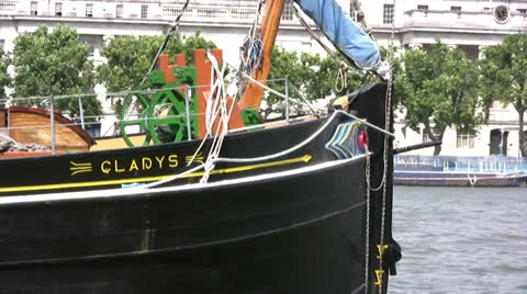 Bow of a black boat on the river Thames Stock Footage 25946506