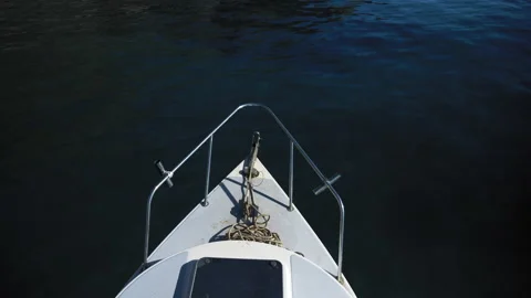 The bow of a boat floating int the ocean Stock Footage 167679769