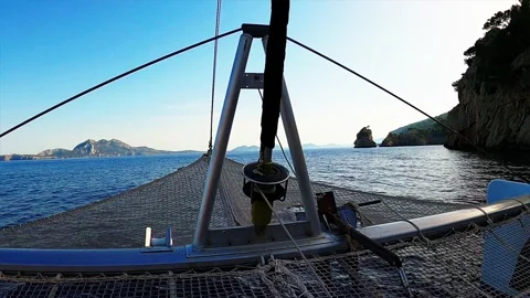 Bow of the boat in the foreground with a beautiful turquoise sea Stock Footage 198747906