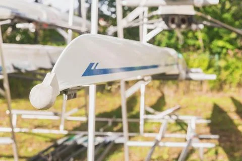 The bow of a boat that hangs upside down in a warehouse Stock Photos