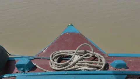 The bow, front of the vintage boat float straight ahead along river. Stock Footage 197342421