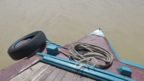 The bow, front of the vintage boat float straight ahead along river. Stock Footage 197348549