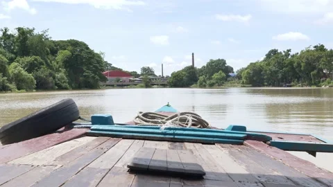 The bow, front of the vintage boat float straight ahead along river. Stock Footage 197348591