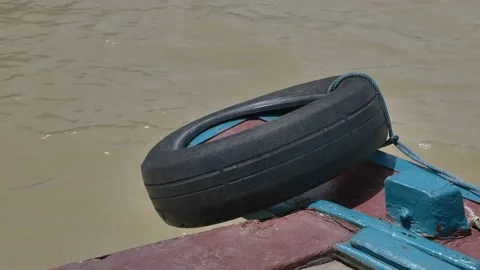 The bow, front of the vintage boat float straight ahead along river. Stock Footage 197348620