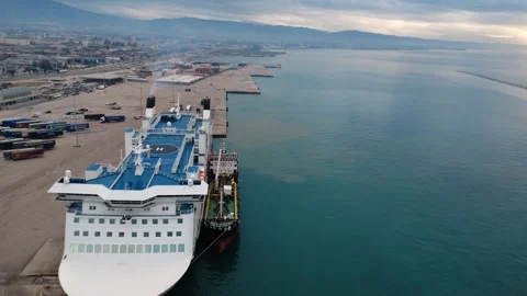 Bow of Large Ferry Anchored in Polluted Harbor Waters Stock Footage 343995165