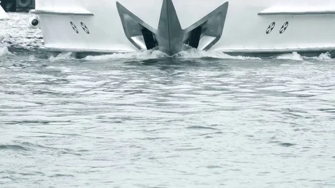 The bow of a moving motor yacht and water surface Stock Footage