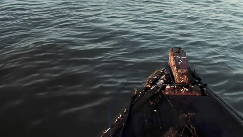 Bow of an Old Row Boat on River at Sunset. Close Up. Slow Motion. Stock Footage 254448011