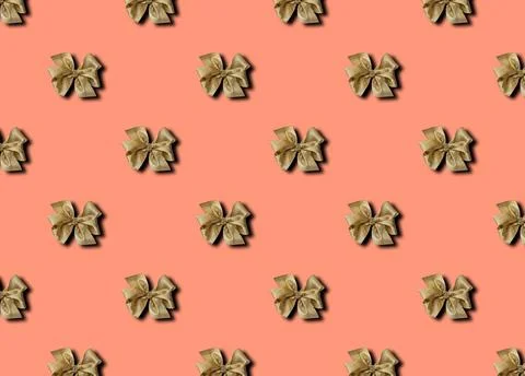 A bow on a pink background. Seamless pattern gift wrapping photo. Stock Photos