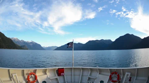 Bow point of view Time lapse of a ship entering Parque Pumalin fjord at predawn 스톡 동영상 27192966