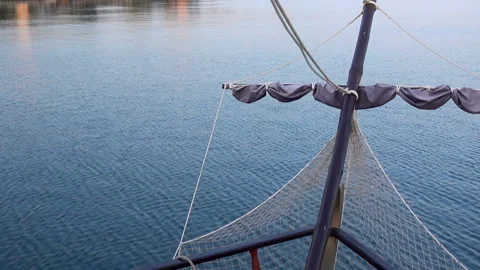 Bow of a sailing ship with folded sails in motion. Video stock 114295370