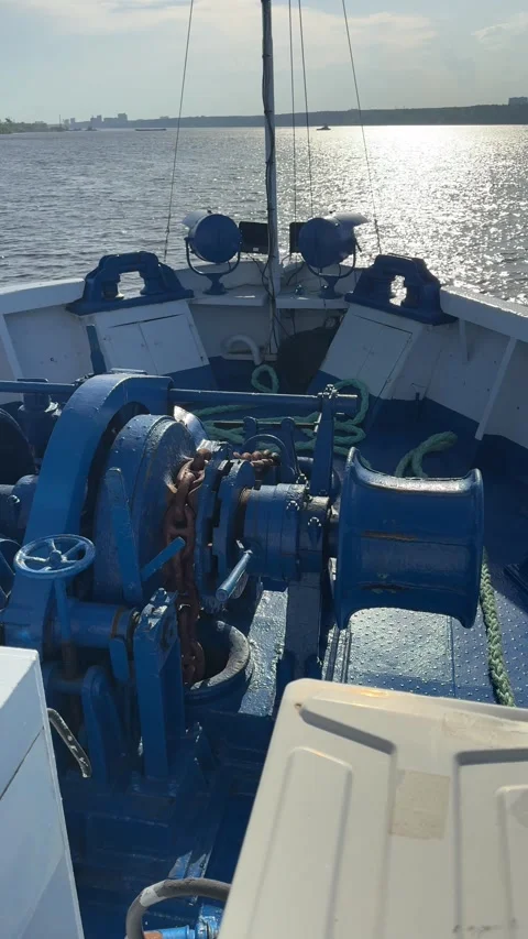 Bow section of river cruise ship sailing smoothly along the river, cutting th Stock Footage 310612772