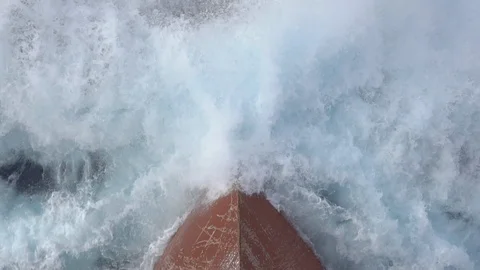 Bow of the ship cuts the sea waves with spray and dive Stock Footage 115800272