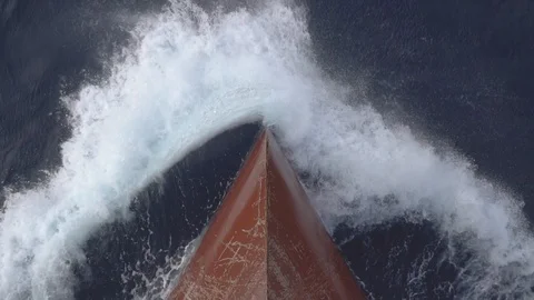 Bow of the ship cuts the sea waves with spray Stock Footage 115800345