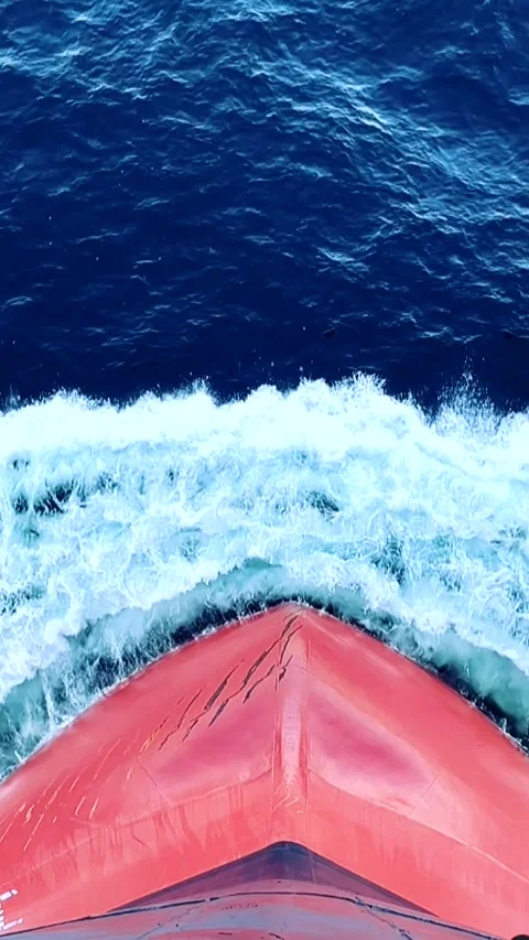 The bow of a ship cutting through the waves of the sea in a time-lapse video Stock Footage 277395315