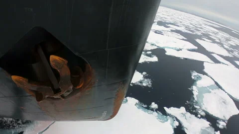 Bow of ship flies over water with ice. Black bow of vessel with anchor Stock Footage 144677774