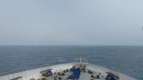 Bow of a ship in a rough sea, tilting to the left side. Video stock 201377982