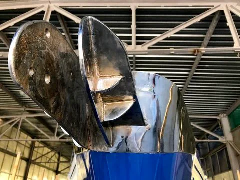 The bow of the ship standing in the hangar. Stock Photos