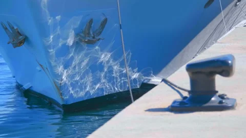 On the bow of the ship sunlight and waves on water create a beautiful pattern Stock Footage 104102884