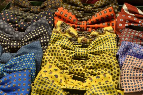 Bow ties in polka-dot pattern for sale in fashion boutiques. Stock Photos