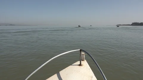 Bow of tourist vessel sailing over Lake Tana, source of Blue Nile, Ethiopia Stock Footage 119233301