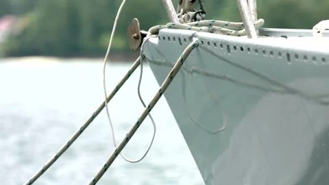 BOW OF YACHT BOBBING ON CURRENT Stock Footage 141746919