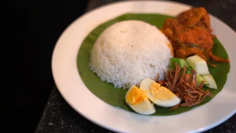 bowel of rice plating on banana leaf egg... | Stock Video | Pond5