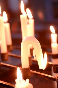 Bowing candle Stock Photos