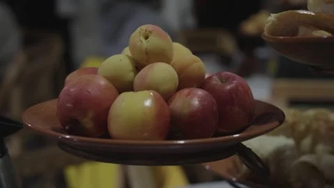 Bowl of apples on a table inside a yurt, Naryn Region, Kyrgyzstan Видео 347242956